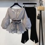 Wrap Top With Voluminous Sleeves And A Waist-Defining Belt With Sleek Black Slit-Hem Trouser