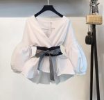 Wrap Top With Voluminous Sleeves And A Waist-Defining Belt With Sleek Black Slit-Hem Trouser